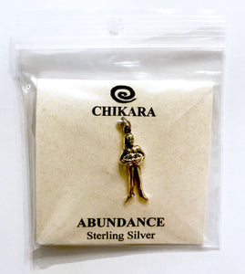 Abundance charm packaged in a plastic bag to protect from tarnishing.