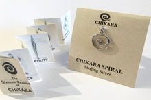 Load image into Gallery viewer, Packaging comes with accordian folded blurb enclosed, which shows the entire Chikara line.