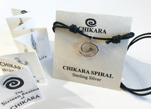 Load image into Gallery viewer, Packaging comes with accordian folded blurb enclosed, which shows the entire Chikara line.