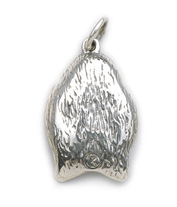 Back view of Introspection charm